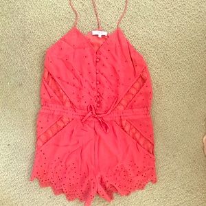 IRON pink romper with lace and button detail
